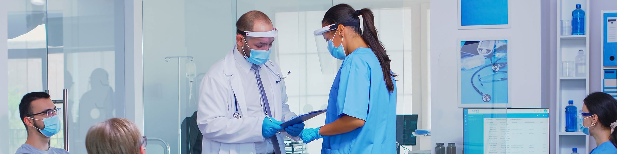 nurse and doctor consulting with masks on